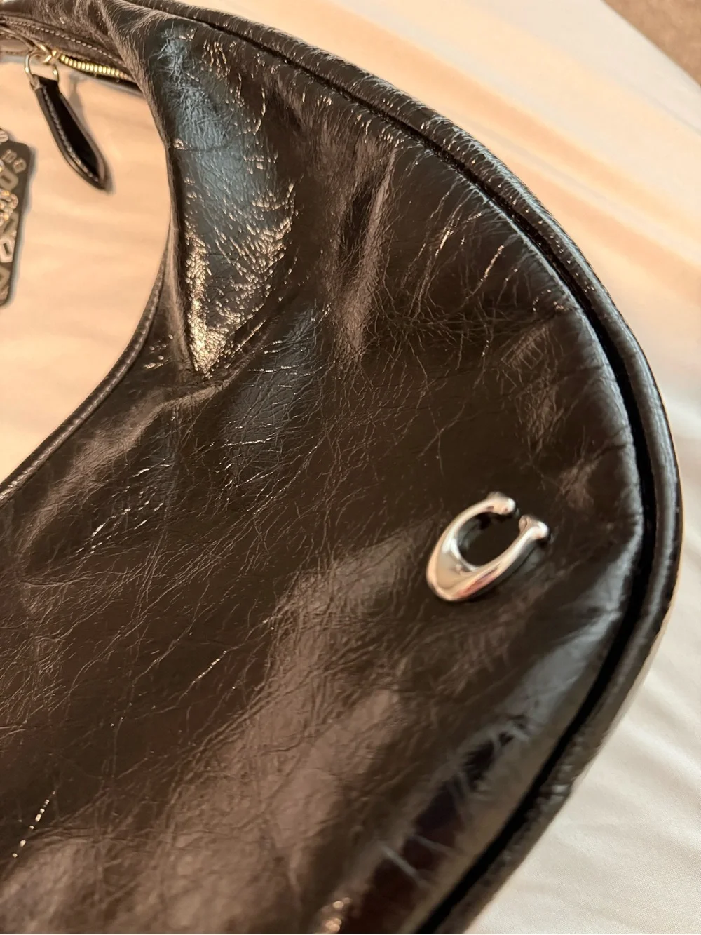 Coach shiny black